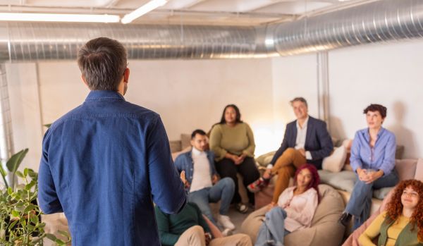 A L&D professional at a casual startup is presenting to their leadership team.
