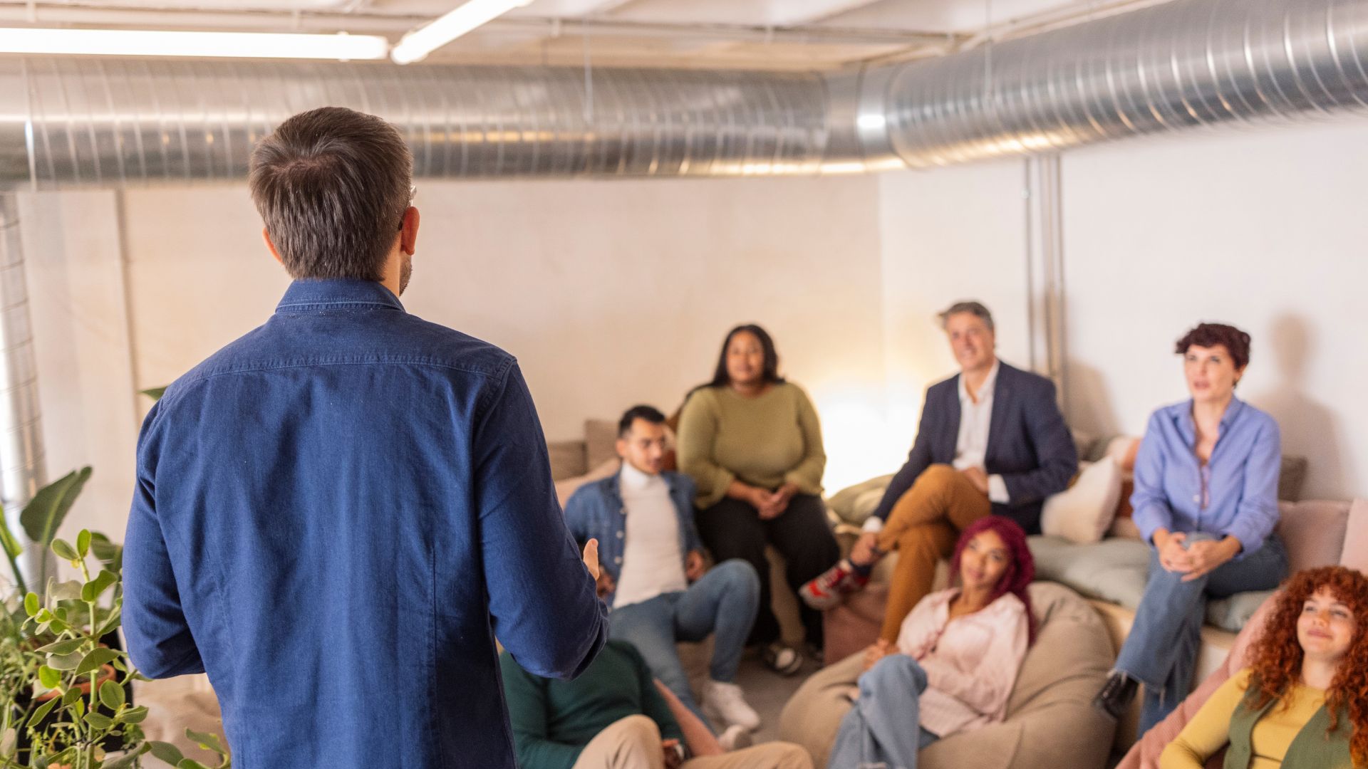 A L&D professional at a casual startup is presenting to their leadership team.