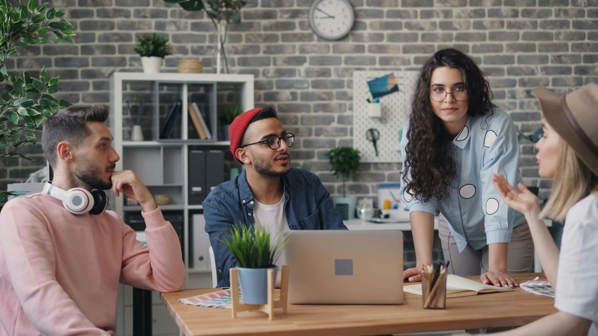 A team is working together on a project in an office.