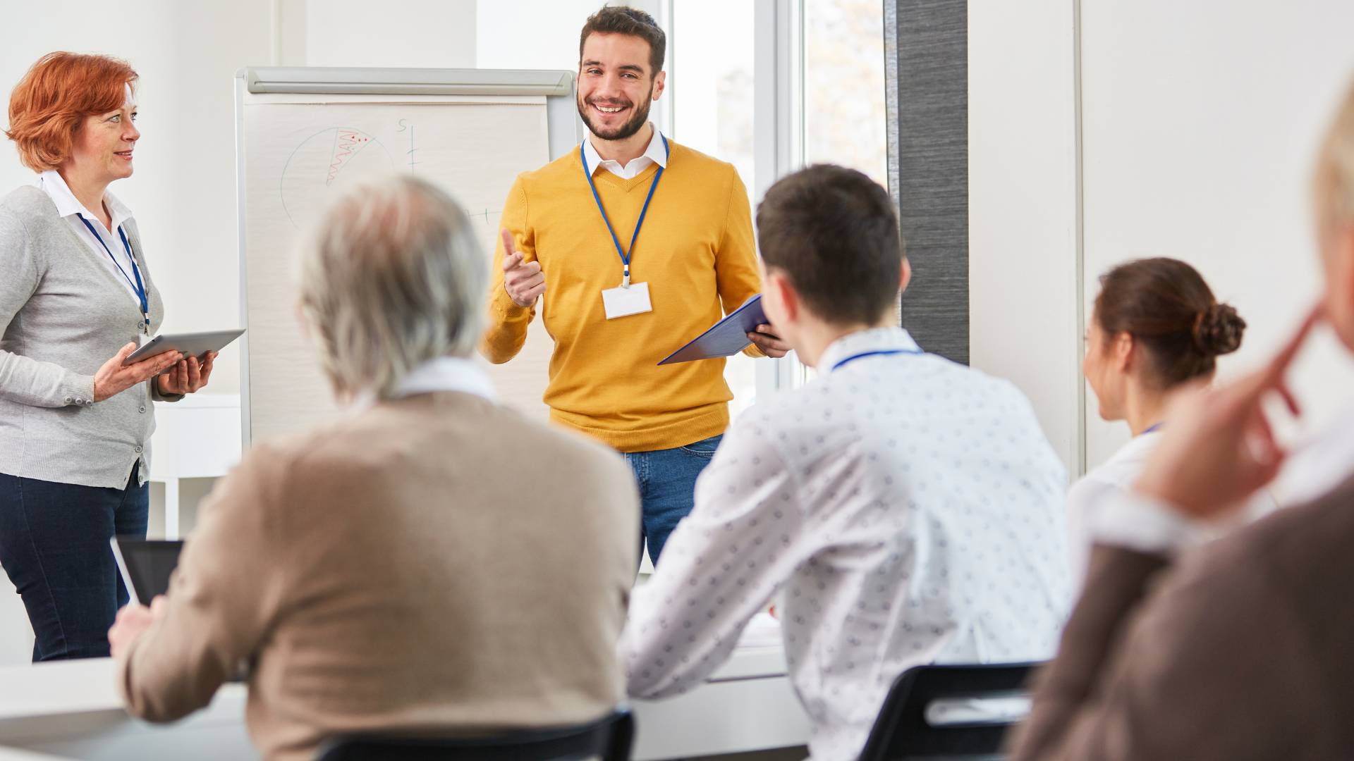 a diverse group of people are participating in professional development program