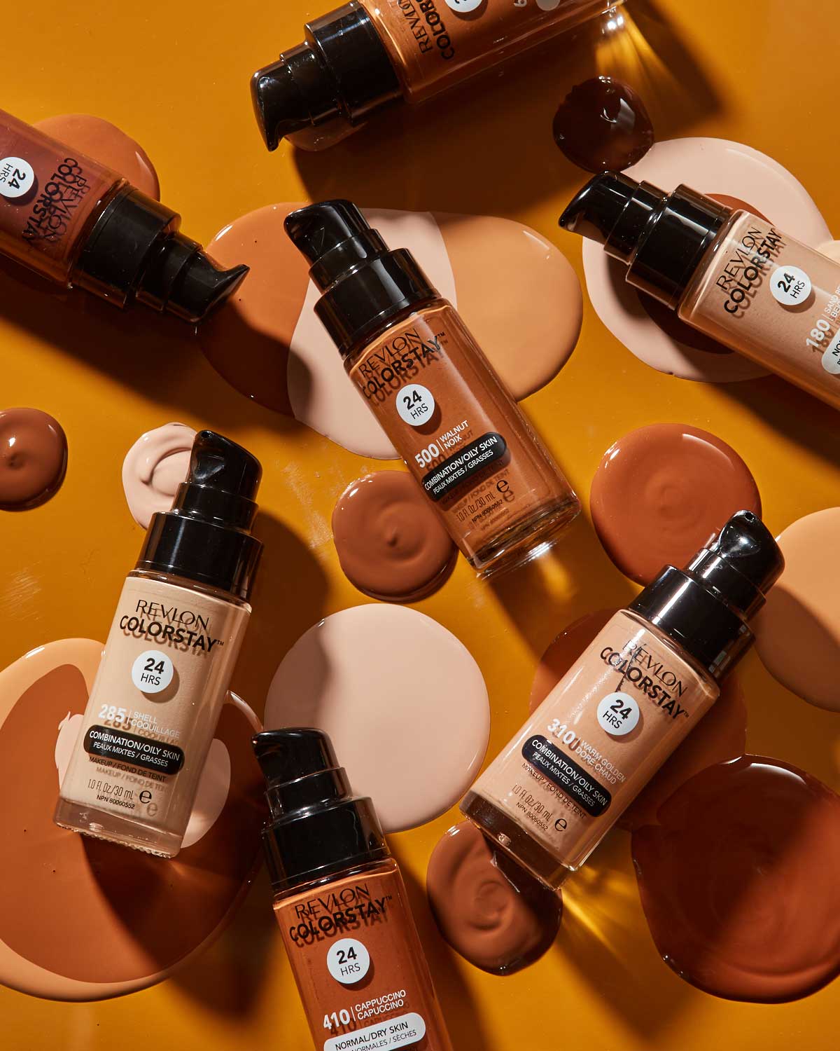  Revlon ColorStay foundation bottles in various shades. Brought to you by Plural, NYC: Experts in Social Media Marketing Strategy and High-Quality Content Production.