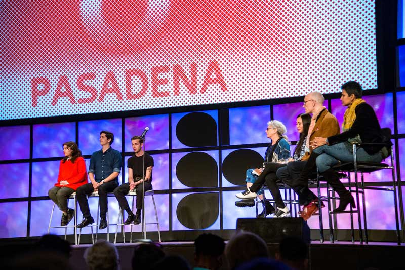 Speakers on stage at AIGA Design Conference in Pasadena. Brought to you by Plural, NYC: Experts in Social Media Marketing Strategy and High-Quality Content Production.