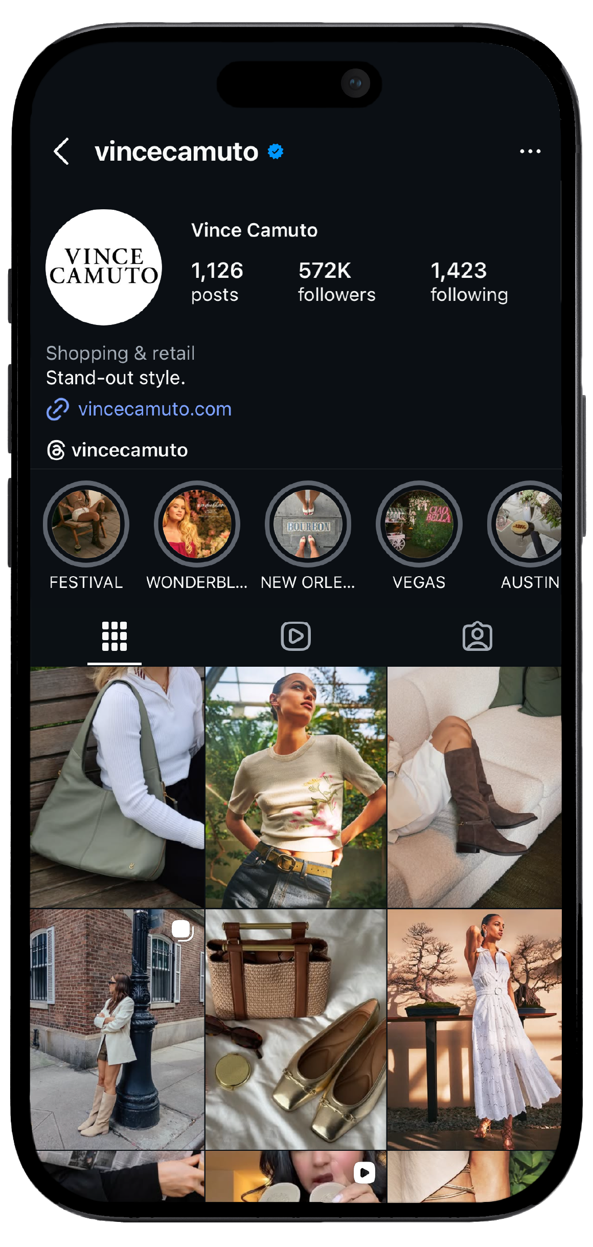 Smartphone displaying Vince Camuto’s Instagram page, showcasing a mockup of the brand's social media interface