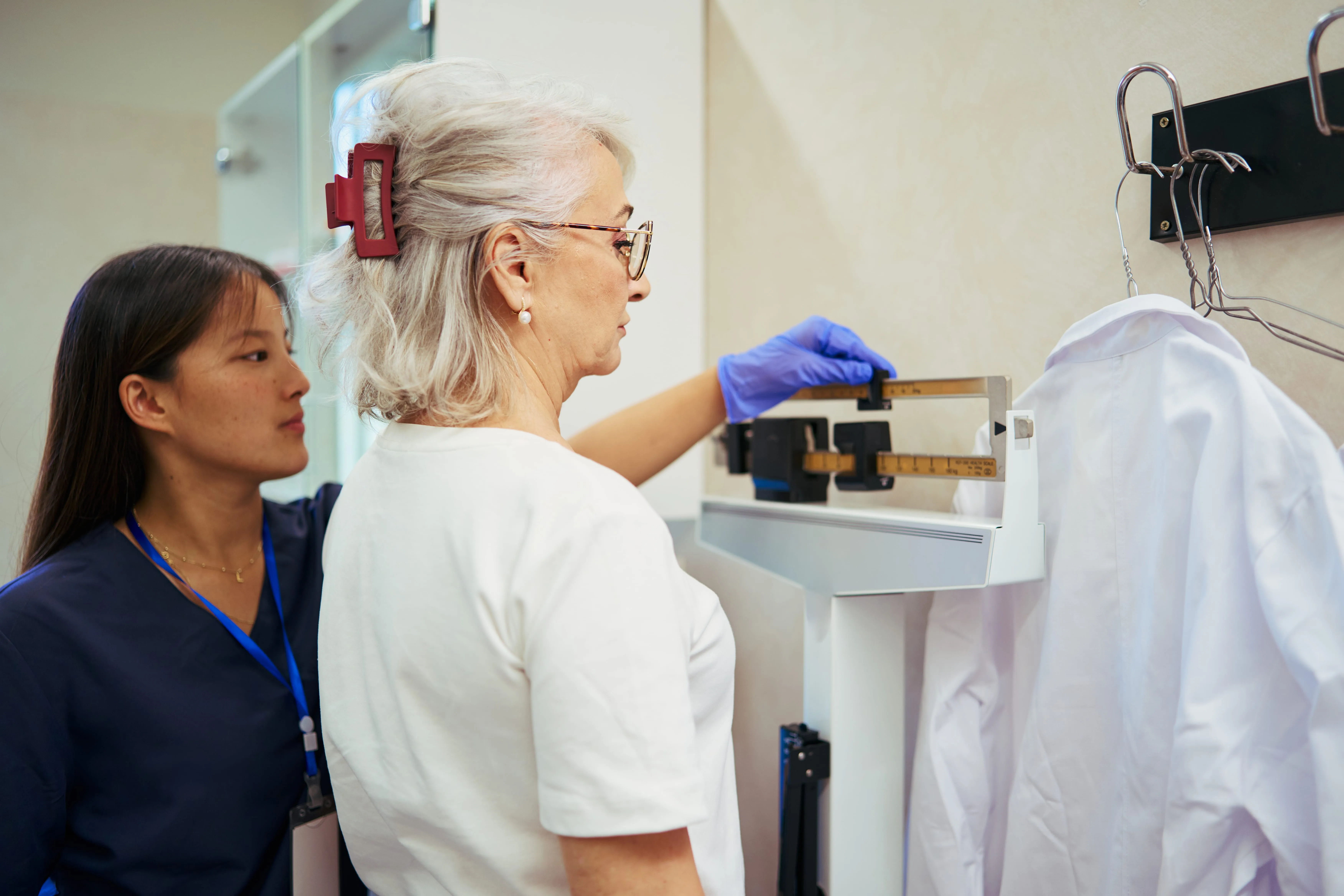 woman weighing on scale