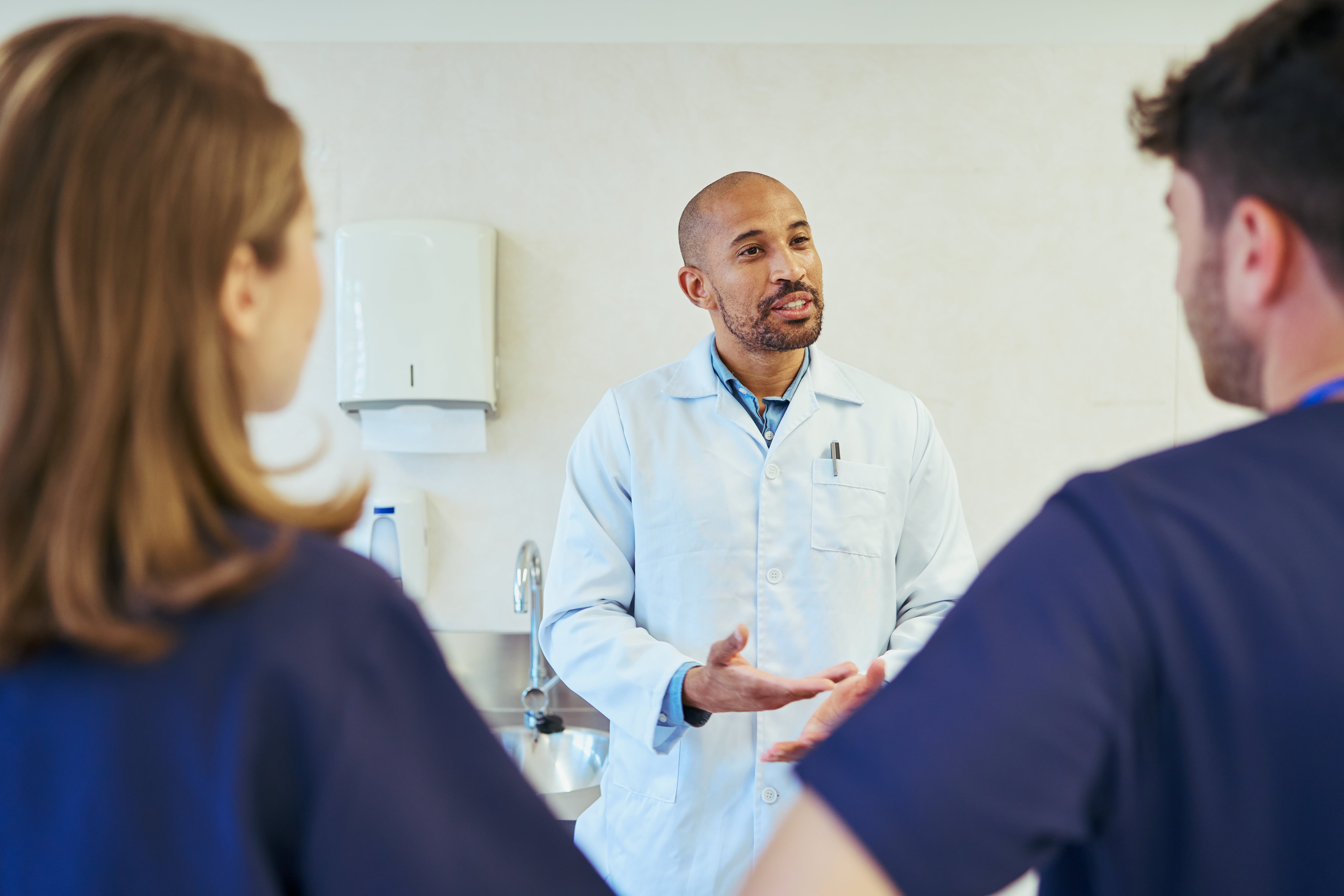 doctor talking to patients