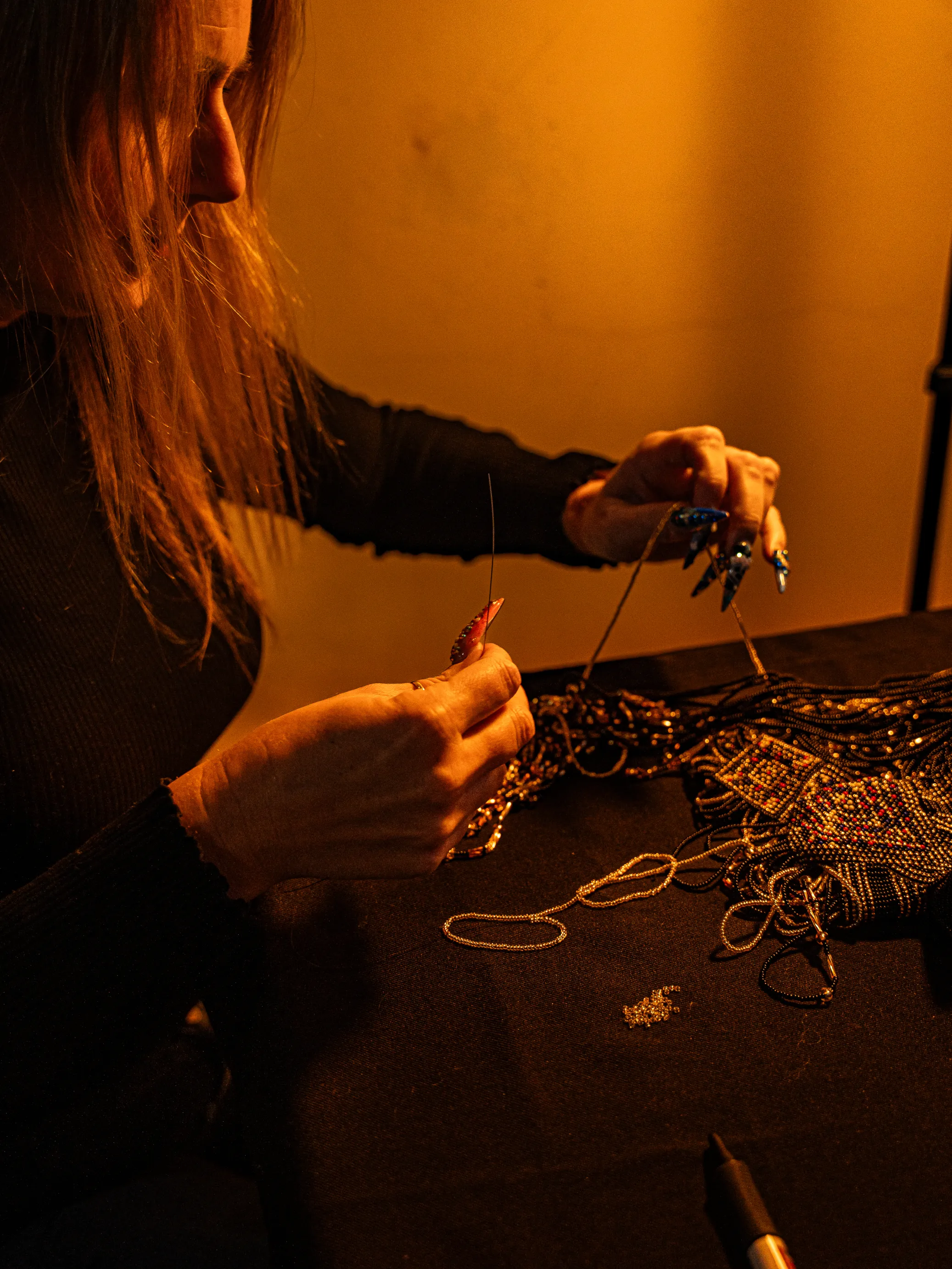 A striking woman wears a daring and elegant piece of African jewelry that captures the soul of the continent.