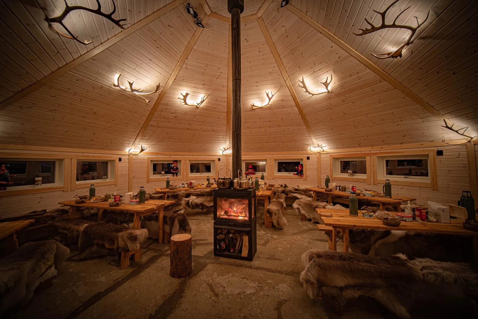 Experience an authentic lavvo stay in Tromsø with reindeer sledding, Sámi culture, traditional food, and Northern Lights in the Arctic wilderness.