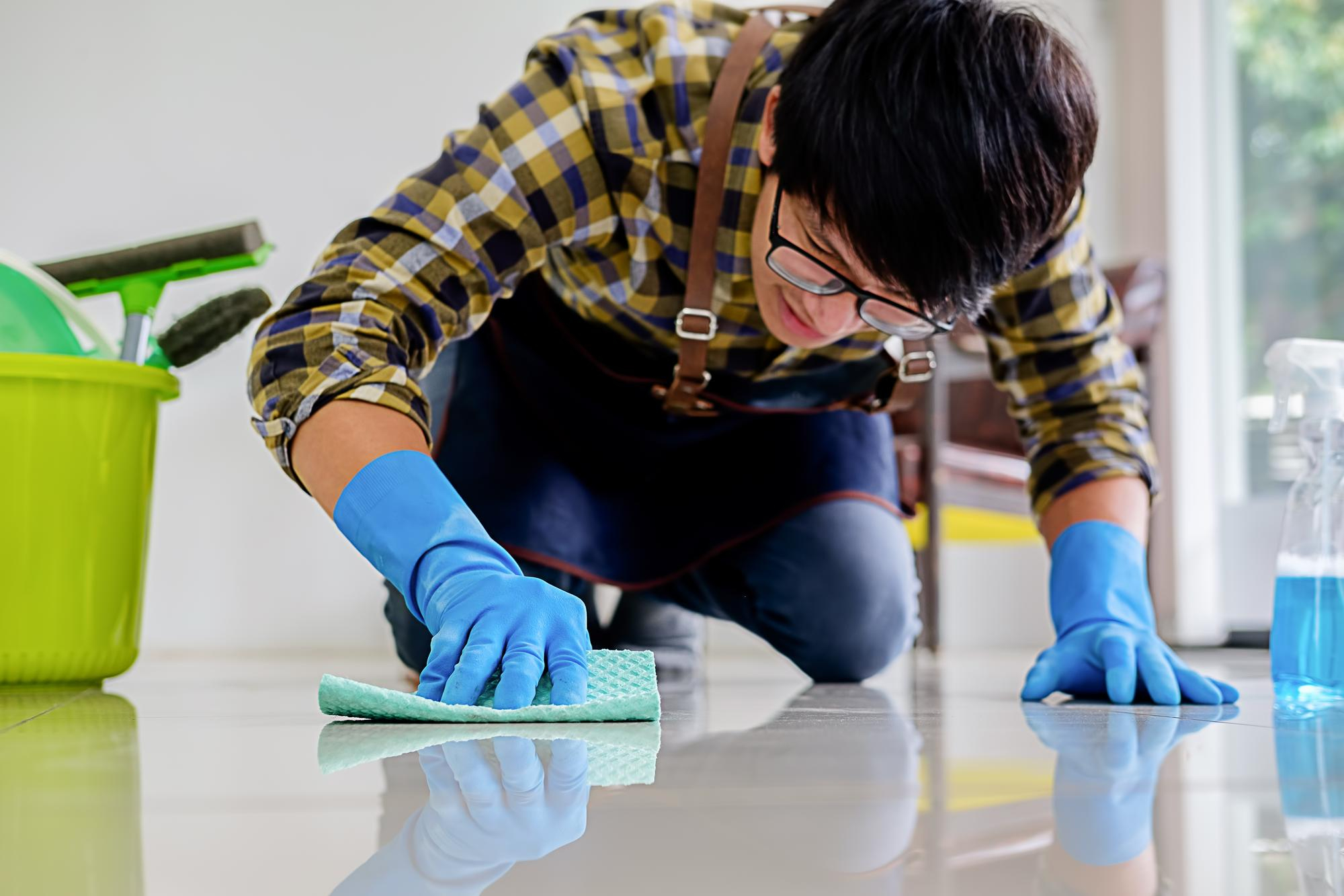 Floor deep cleaning process - scrubbing tile floor