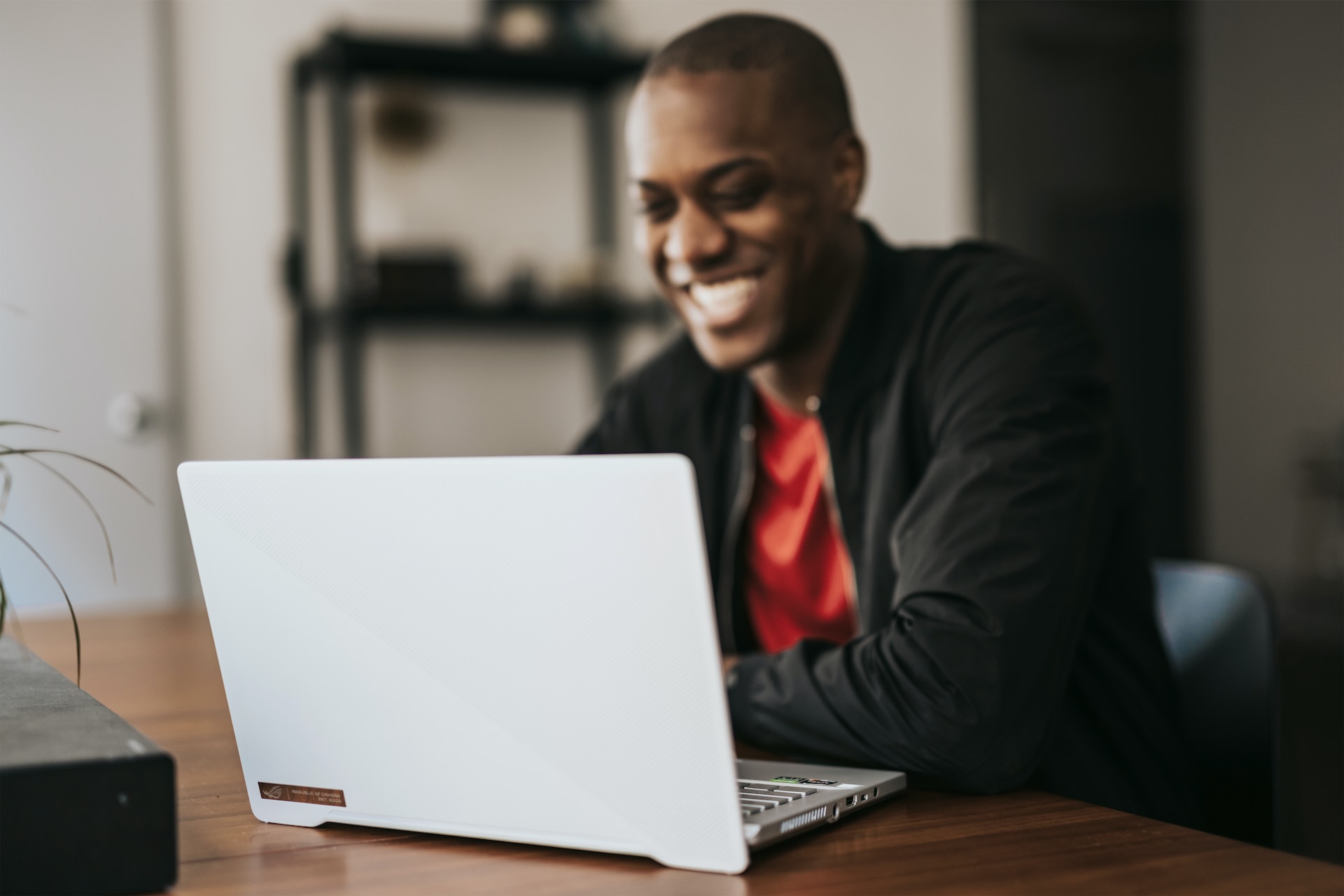 Employee reading an email at laptop