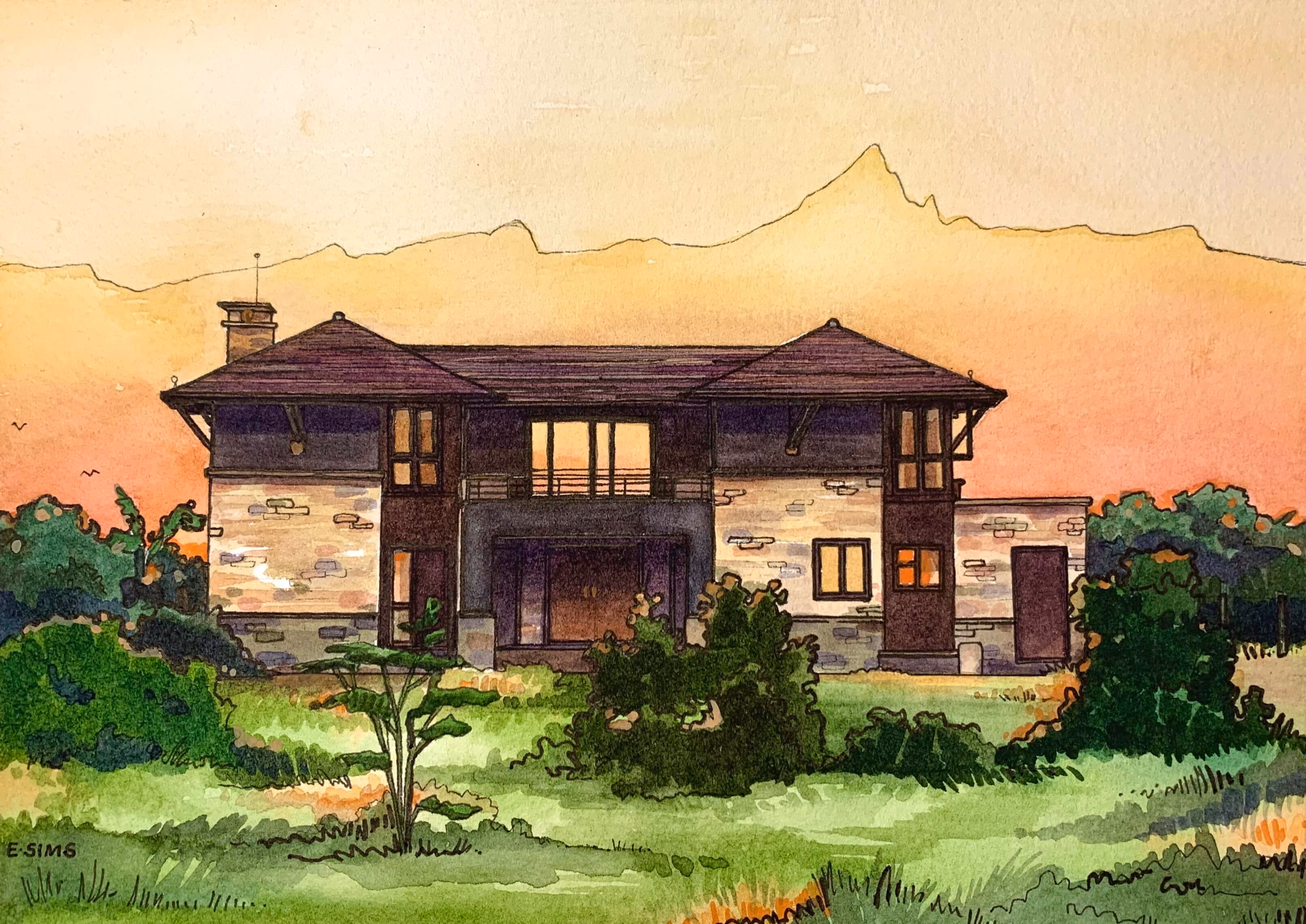 Watercolor painting of a two-story house with dark brown roof and beige stone walls, surrounded by green bushes and grass under an orange and yellow sunset sky.