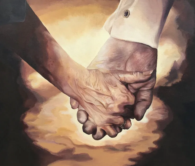 Close-up painting of two elderly hands holding each other against a warm, glowing background.