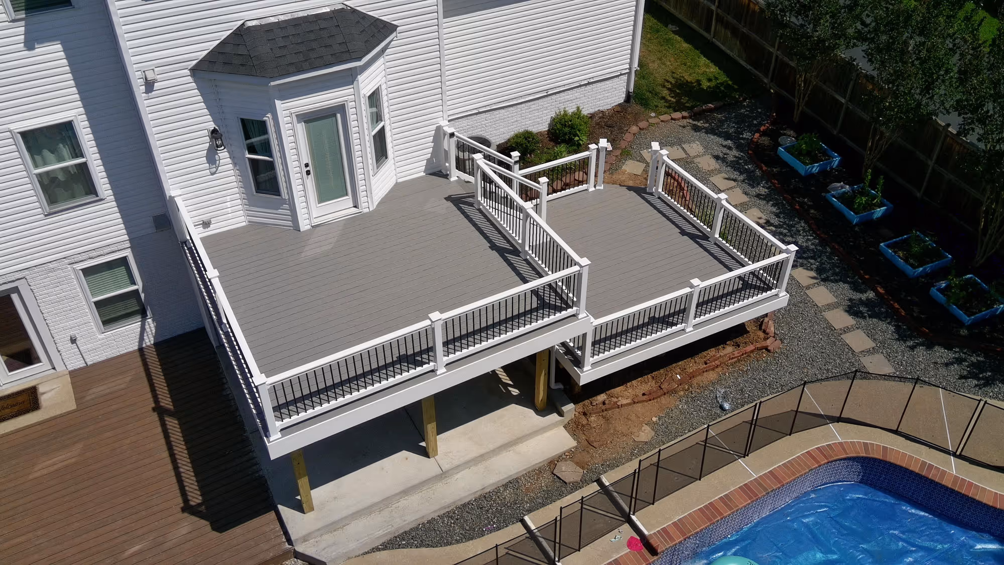 An aerial view of a deck installed by Arca construction.