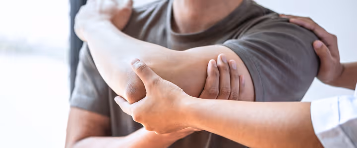 Osteopathic practitioner providing treatment in session.