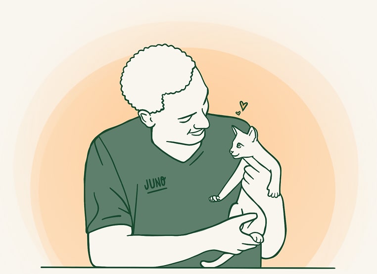 Illustration of a Juno Veterinary team member smiling while holding a cat that looks back affectionately, with small heart icons between them.