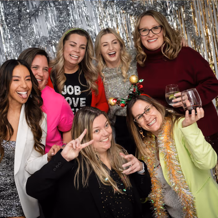 Group shot of Juno's Practice Managers at Juno's 2025 Festive party. 
