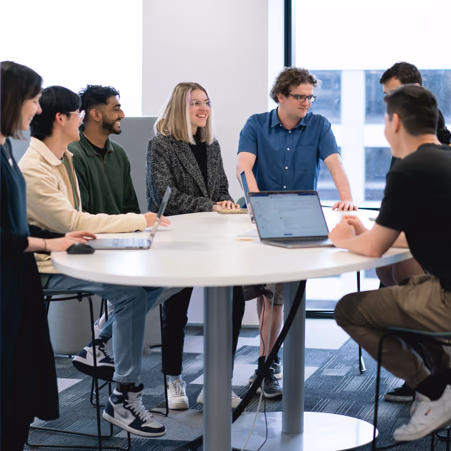 The Snapper Services team gathered, collaborating on transit technology solutions.