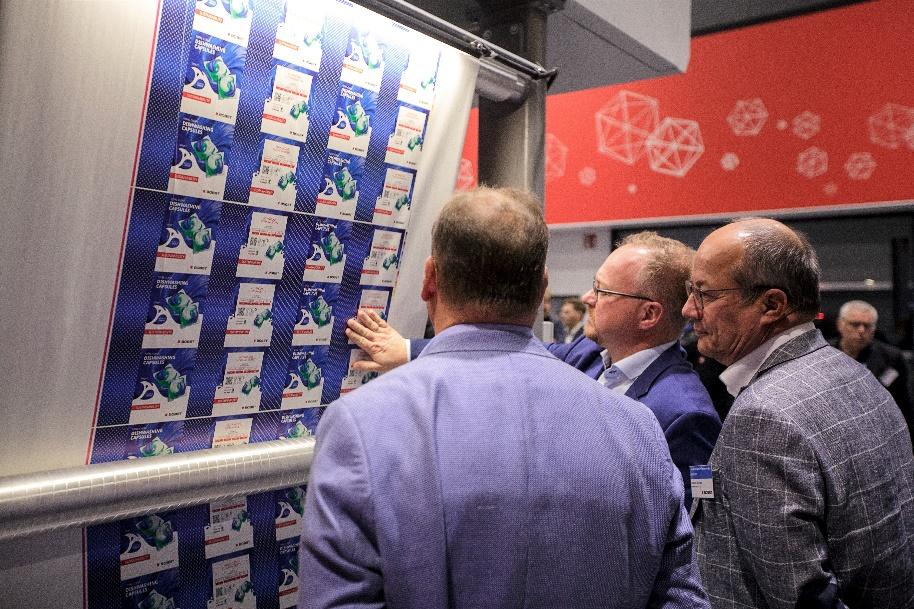 A group of men looking at a posterAI-generated content may be incorrect.