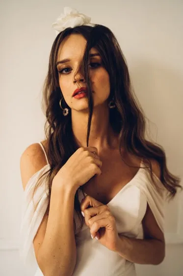 young lady posing in studio