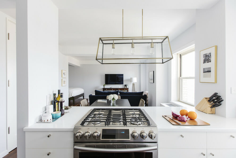 a kitchen with white cabinets