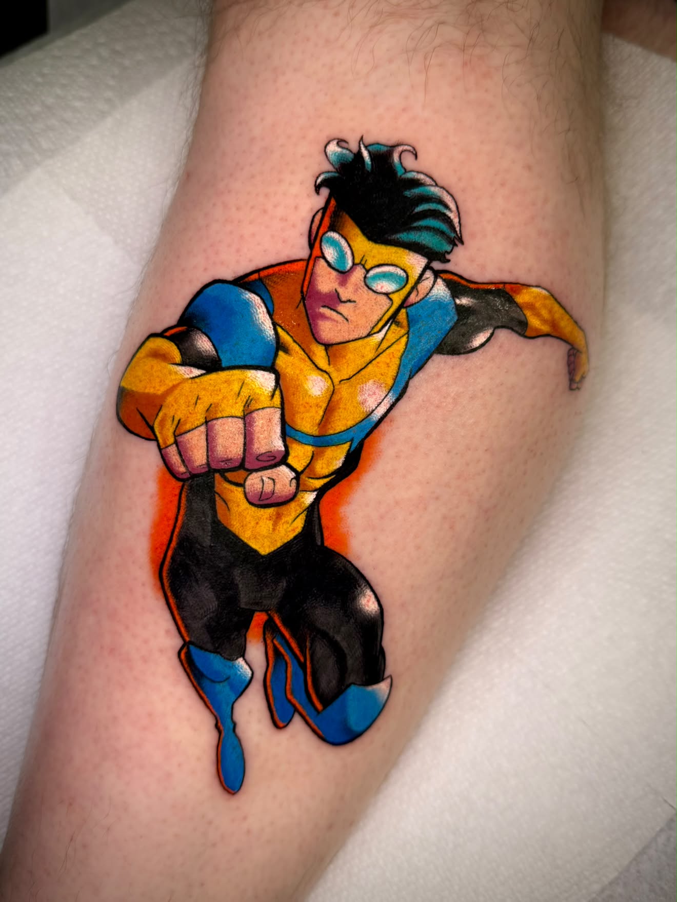 Invincible comic book superhero color tattoo