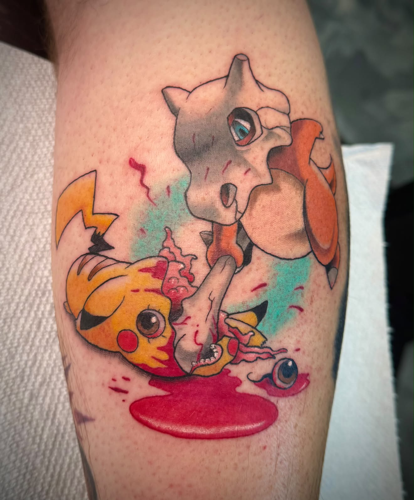 Cubone and Pikachu Pokemon color tattoo