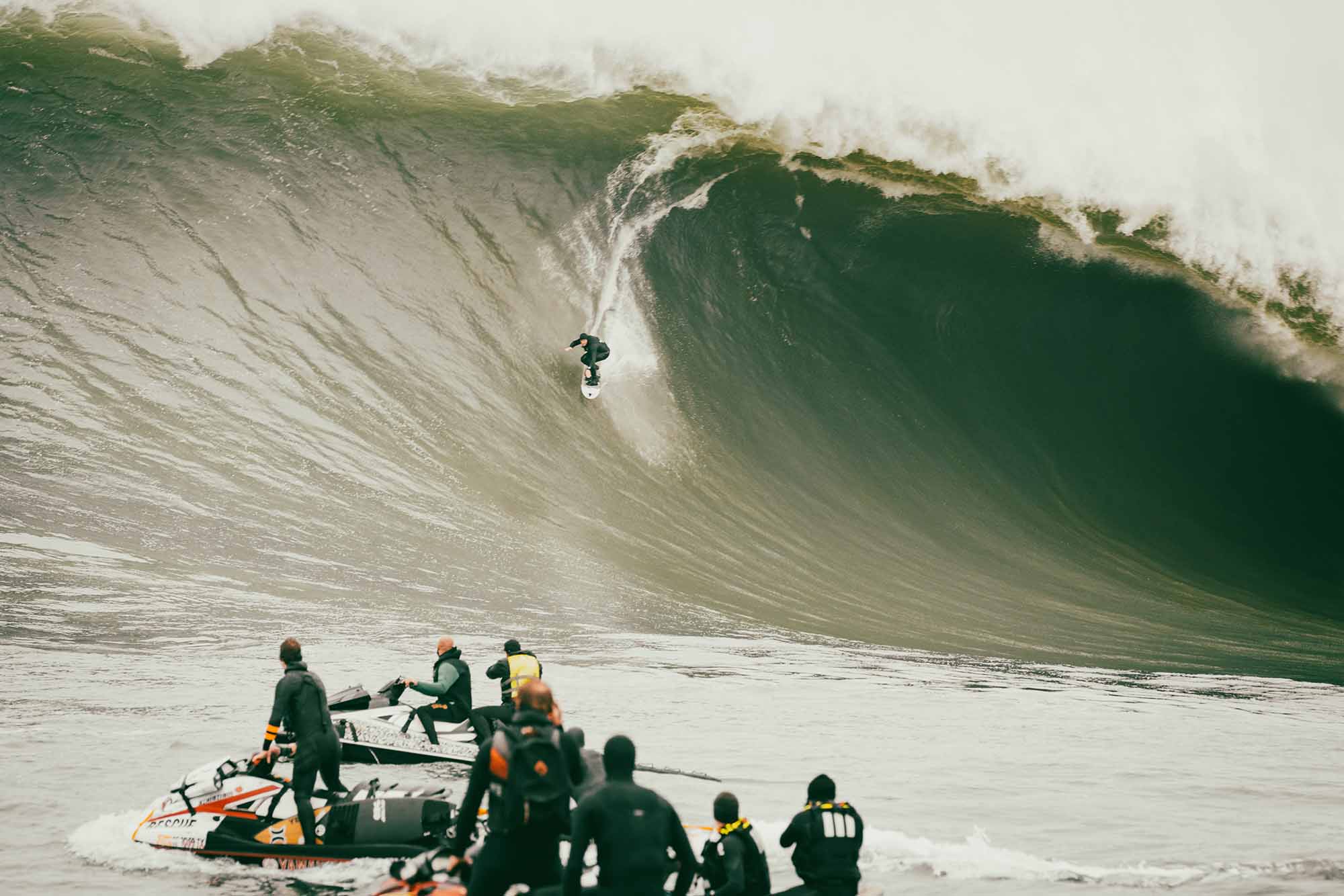 A surfer riding a big wave 