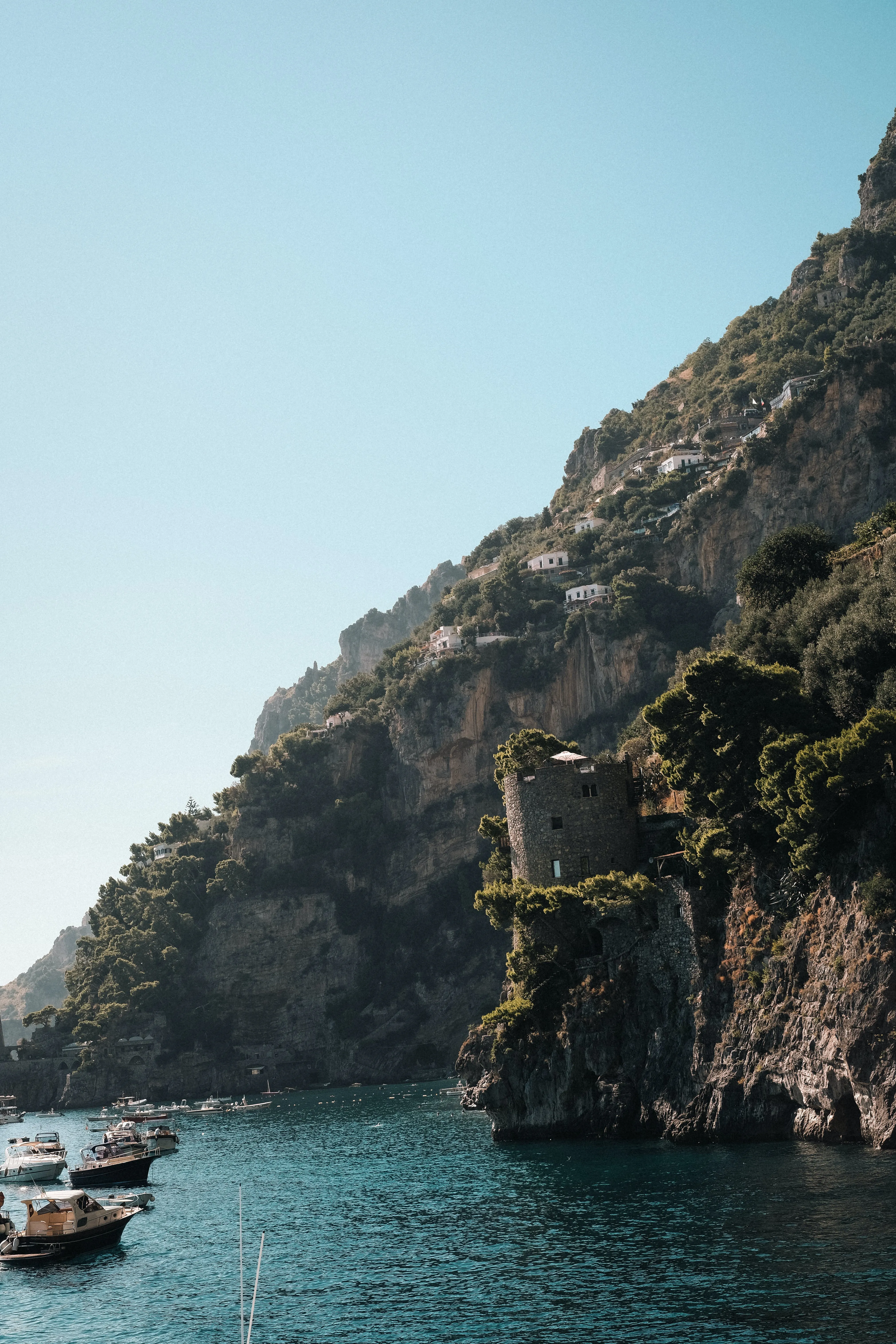 A warm sunny day and a cliff along the Amalfia coastline.