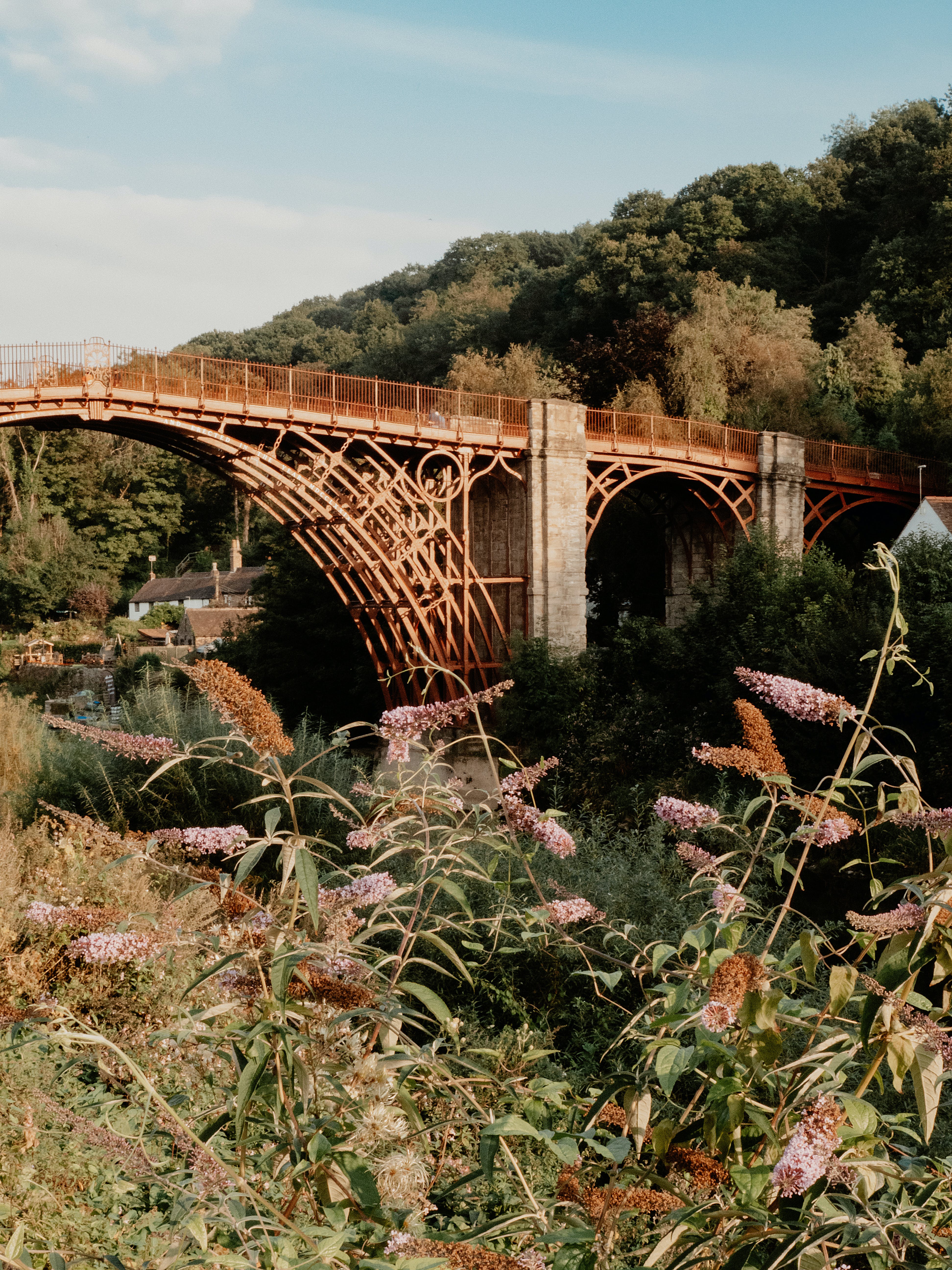 A bridge built in Victorian style in a typical hilly English landscape