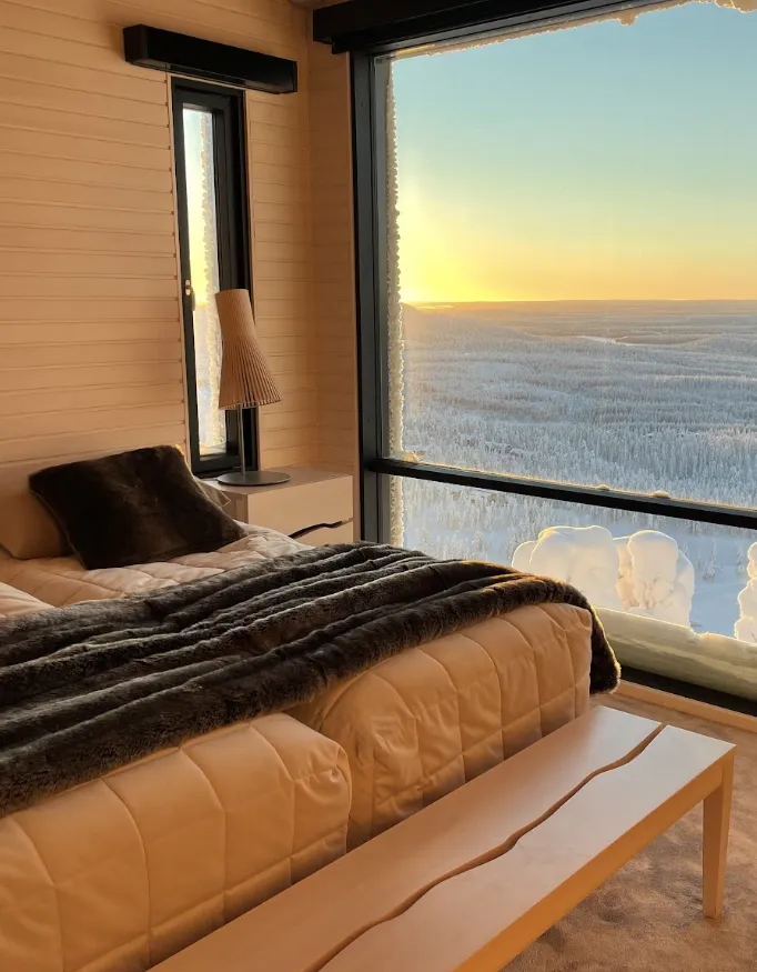 A beautiful modern master bedroom with a stunning view at Villa Ruka.