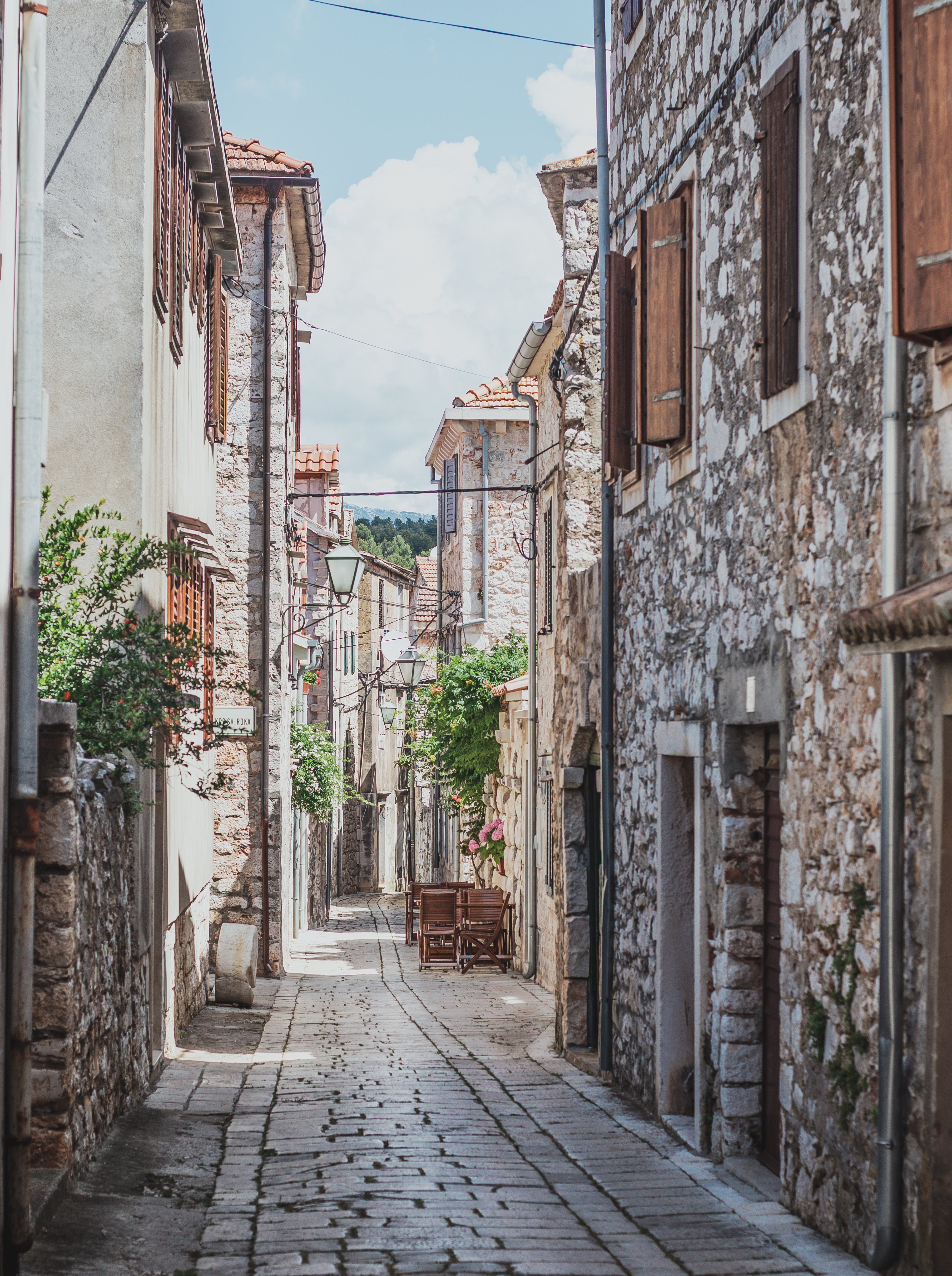 A narrow street in a Croatian city.