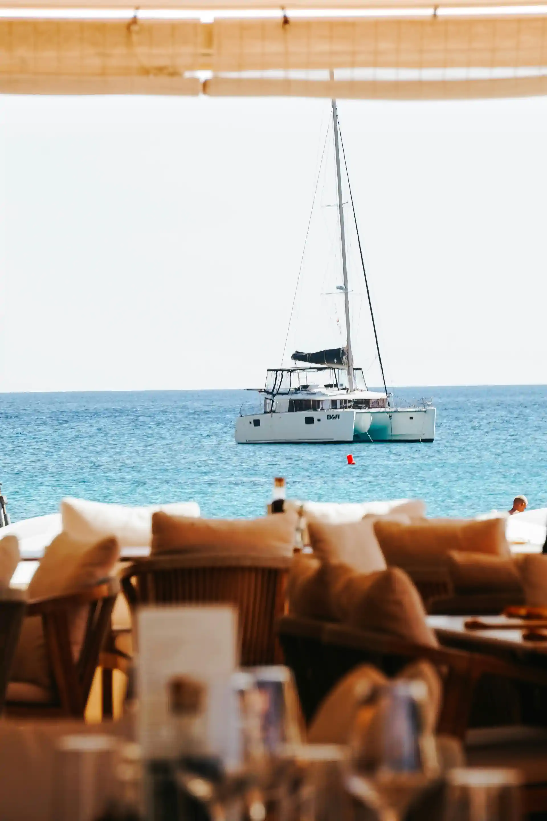 Yacht in front of a beachclub.