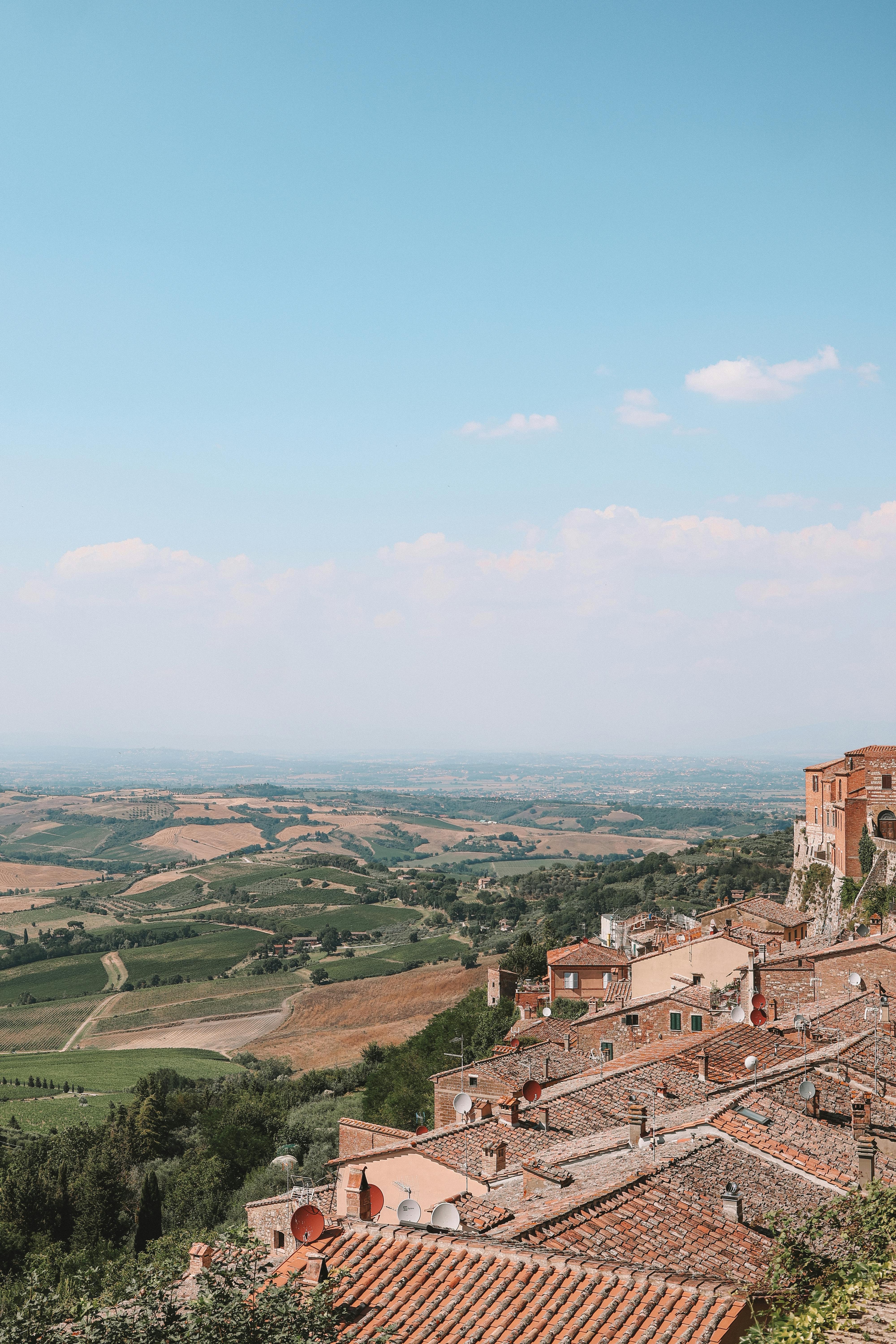 View on a town in Tuscany with a blue sky.