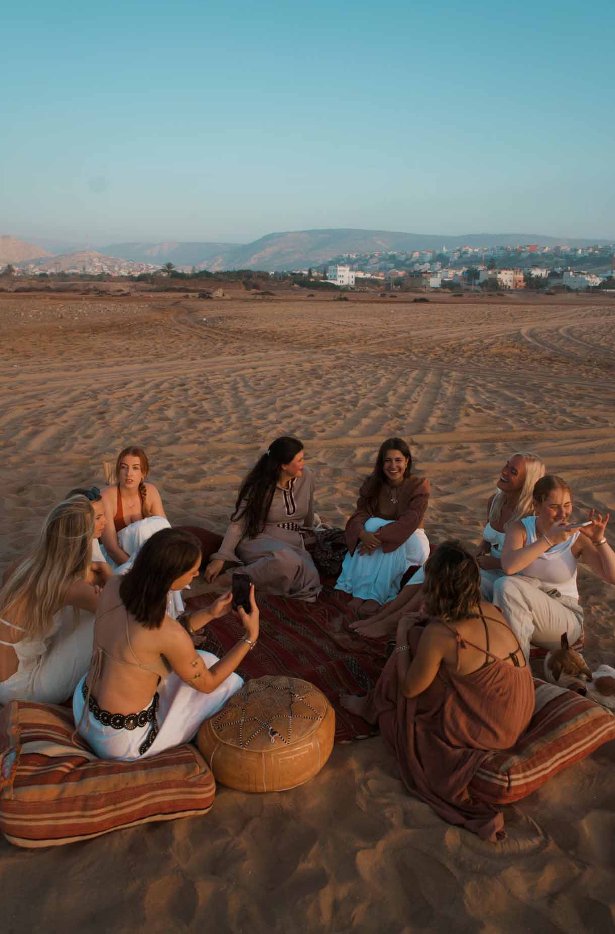 girls having party on the beach