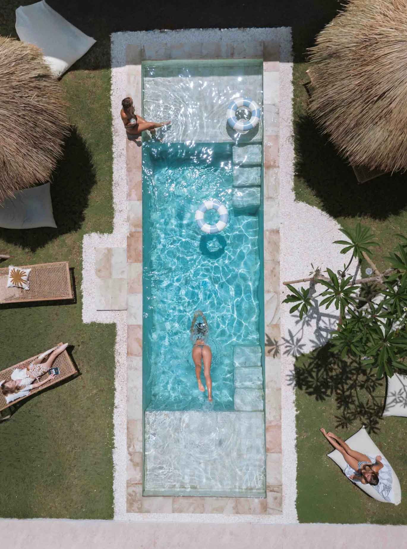 pool with few girls with swimsuite