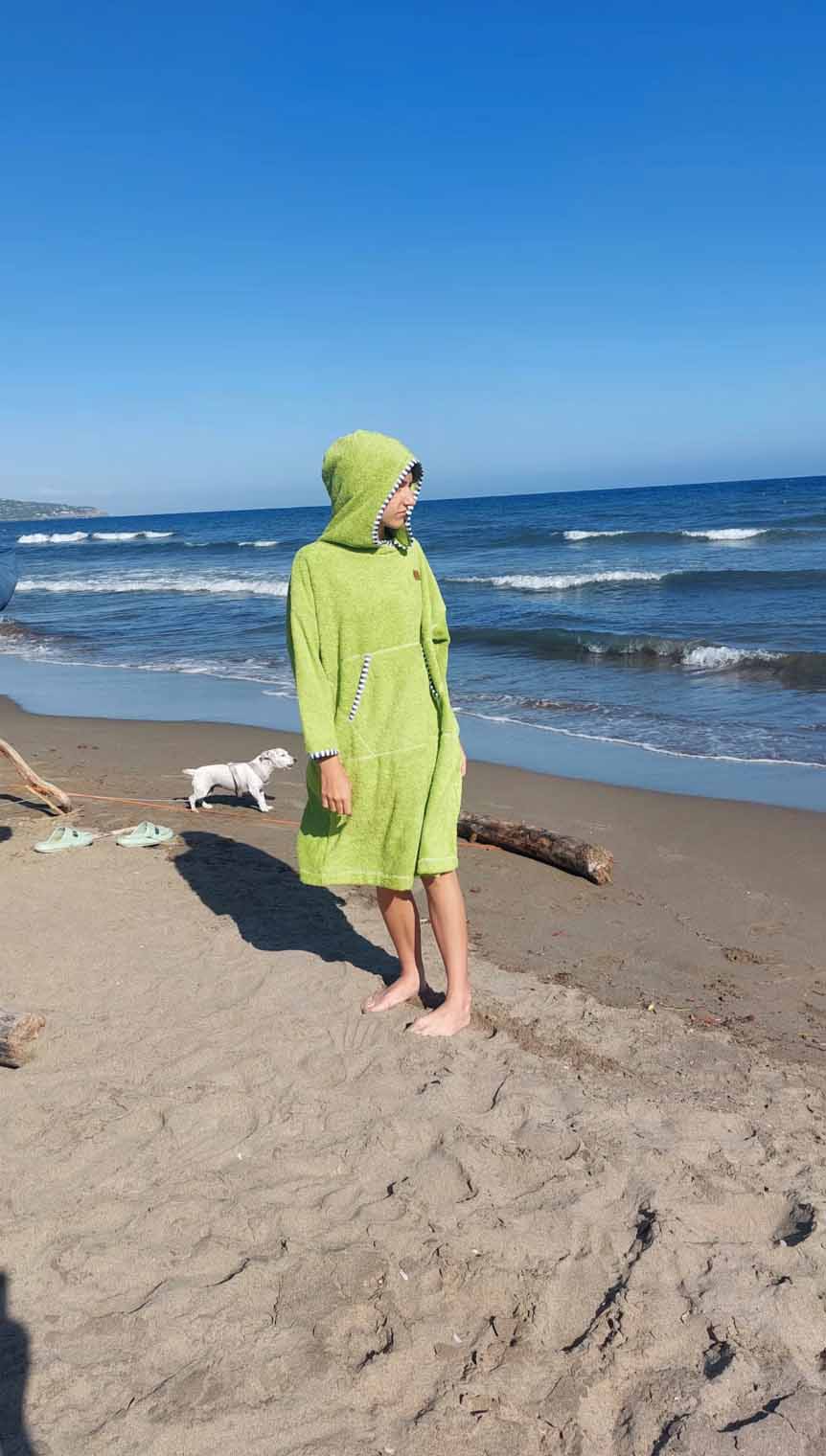 A guy in a surfing puncho