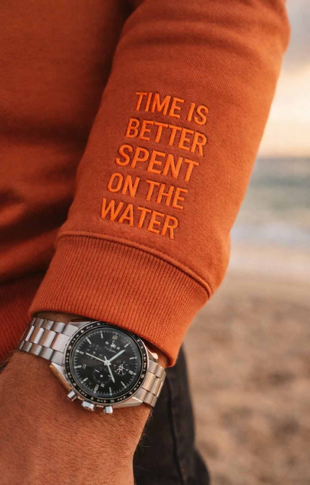 a hand of a guy with a watch