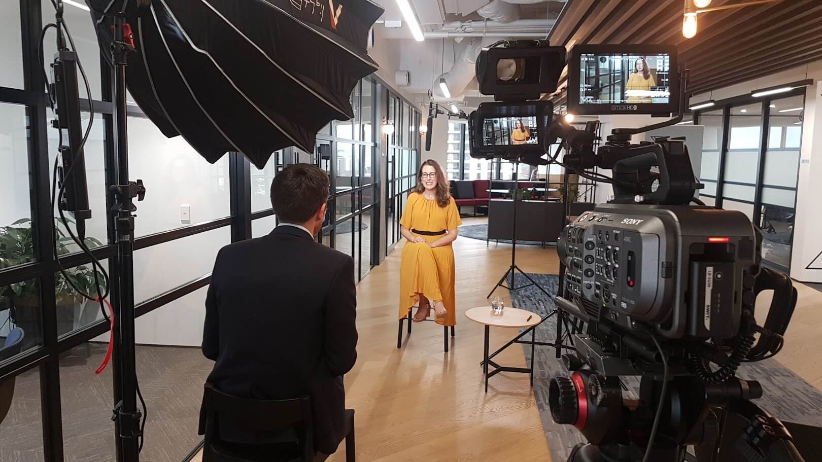 Videographer filming a corporate video shoot in Auckland for AWF’s Recruitment Video.
