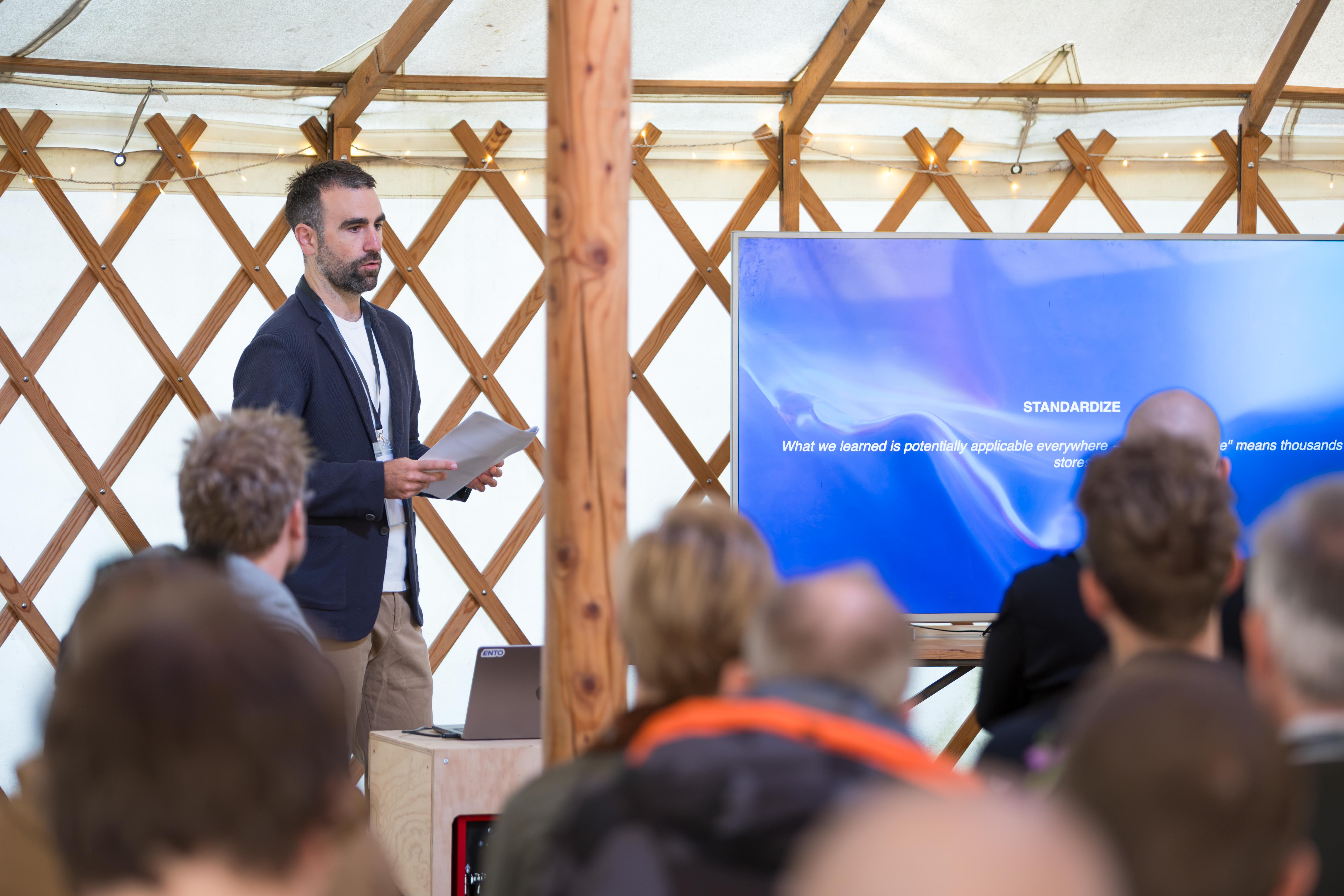 Enrico Ferri of EssilorLuxottica speaking at the Ento Customer Summit