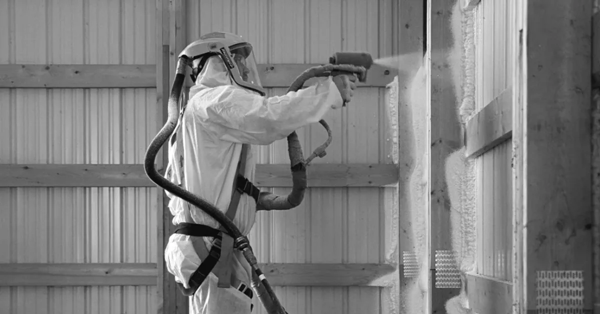 applying spray foam from side, open graph wide crop
