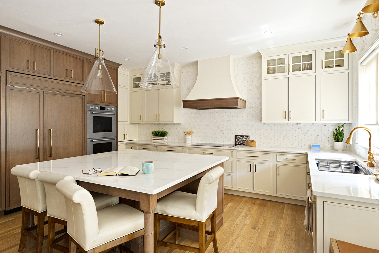 custom hood above range, cherry cabinetry with soft putty painted finishes