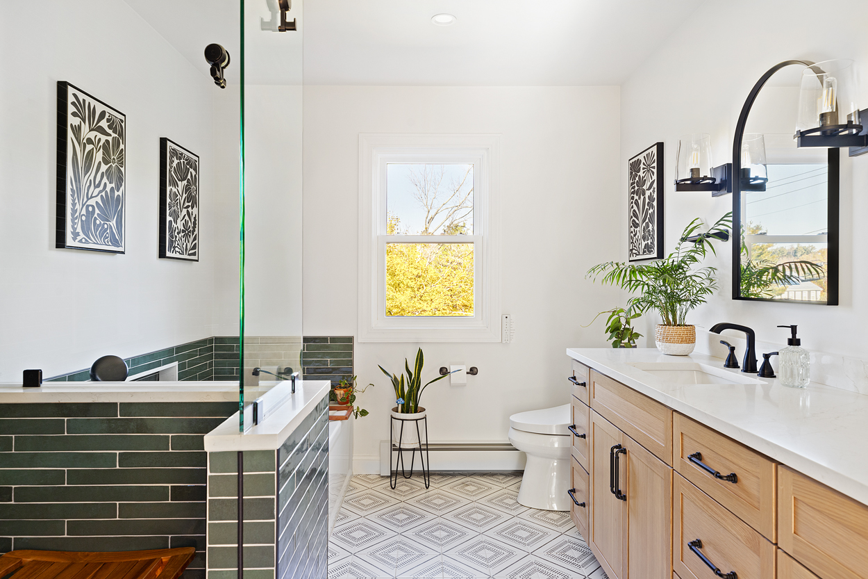  The original undersized primary bath was removed and relocated within a thoughtfully designed addition.