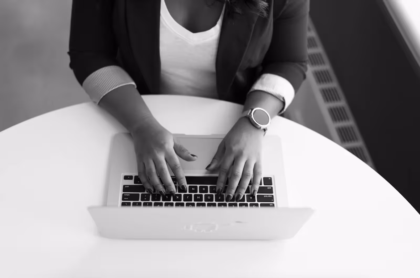  A photo of an accountant working on a laptop