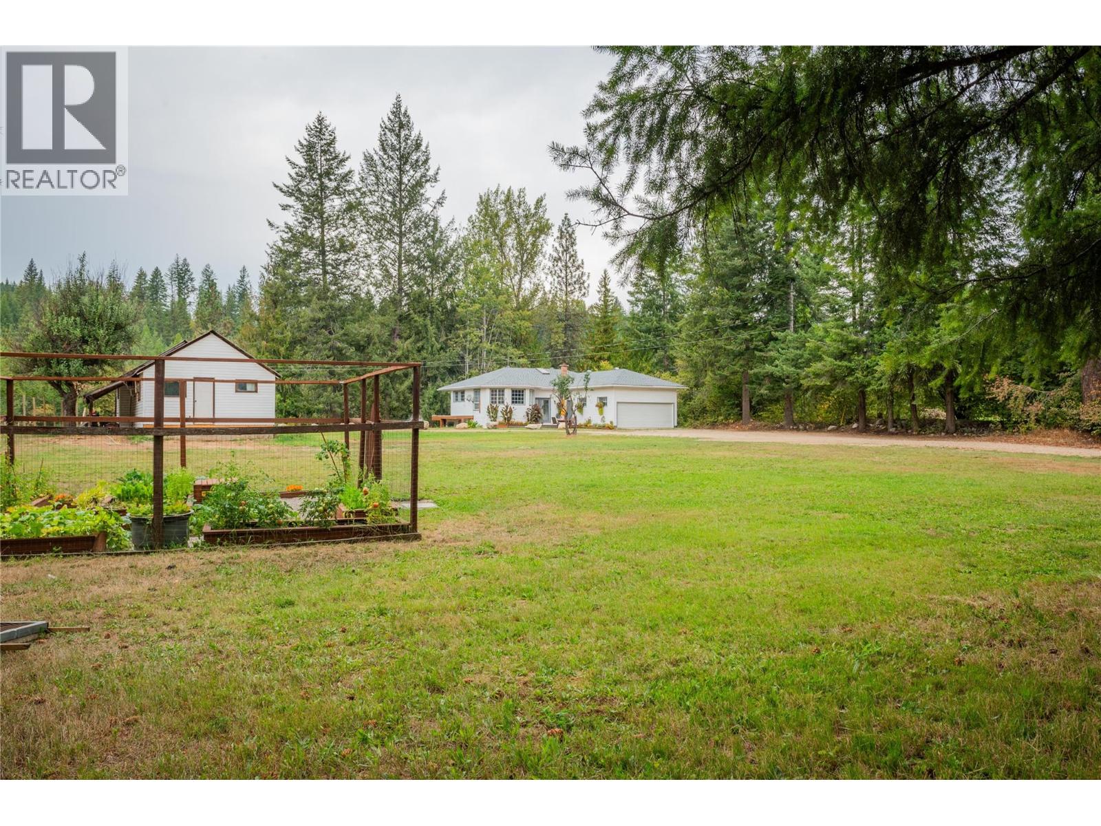 Front yard of the small house and main house.