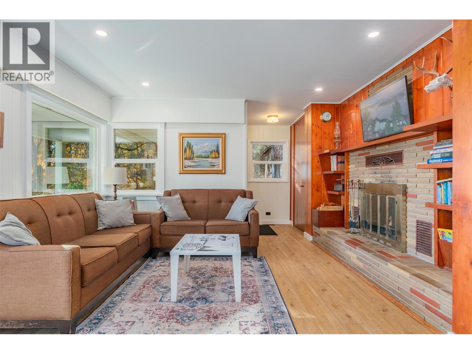 Livingroom with wood burning fireplace