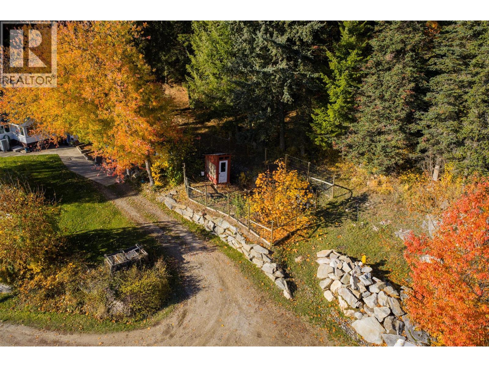 Ariel view of driveway and French draining retaining wall