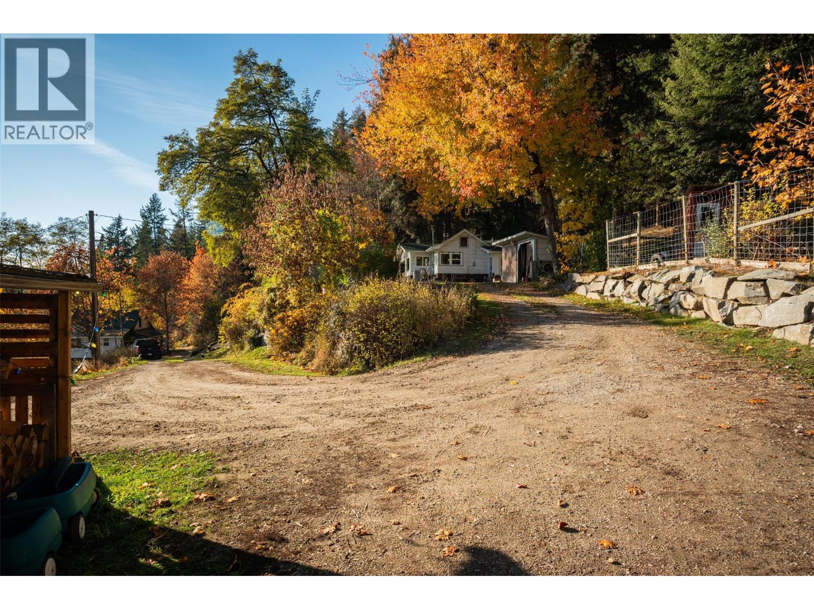 New expanded driveway with room to park and store a camper