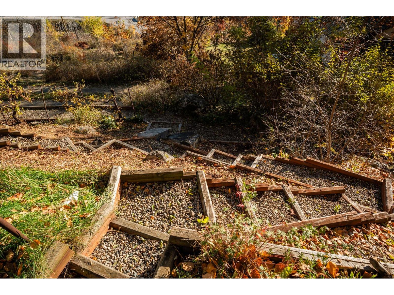 Landscaped stairway to guide you through the front yard and fruit trees.