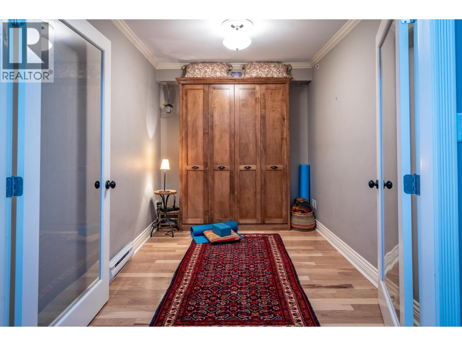 Den with folded Murphy bed