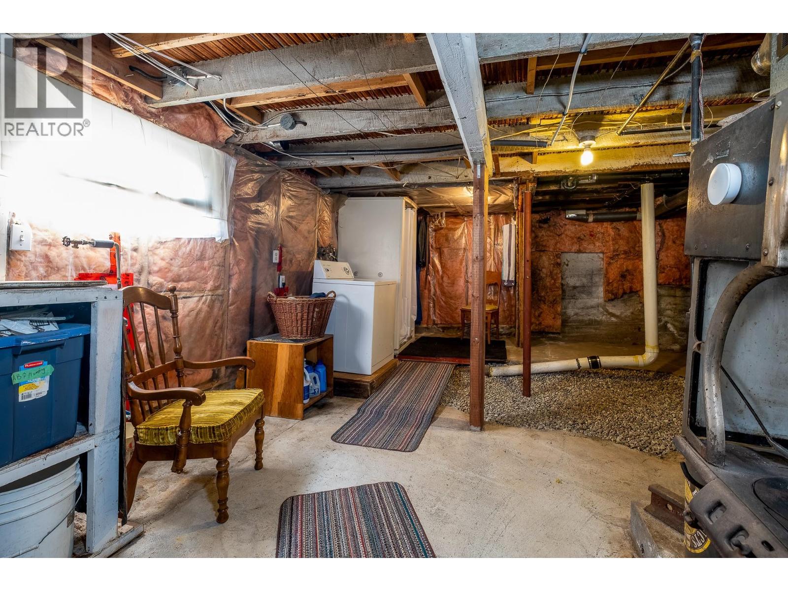 Shower and laundry in the back corner.