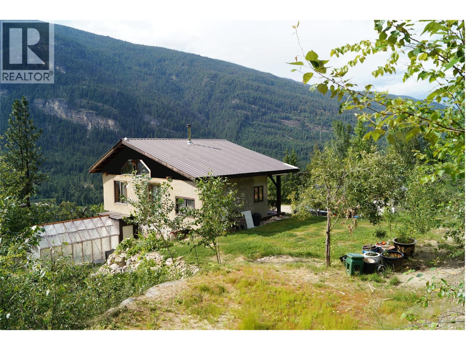 Main Straw-Bale Home and greenhouse